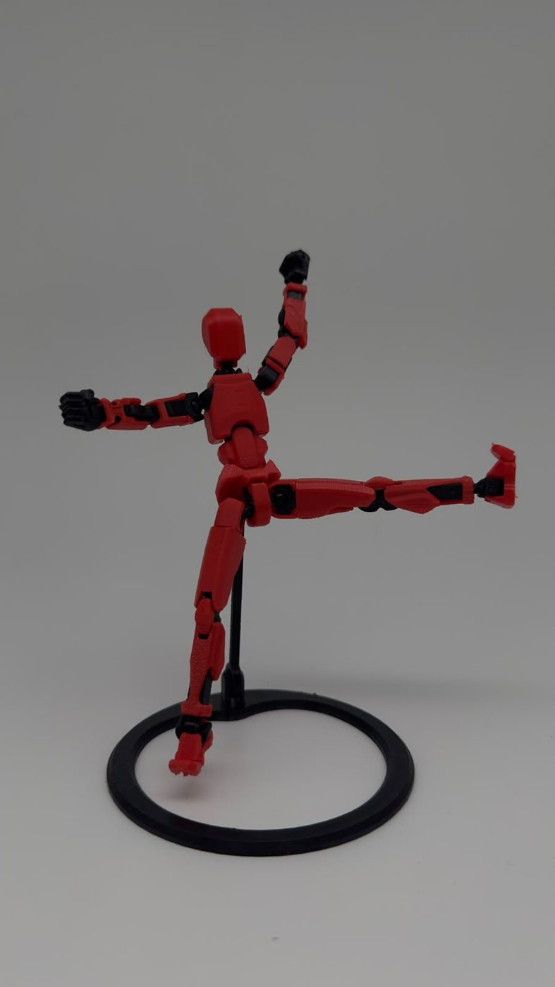 Figura articulada roja poseable sobre base